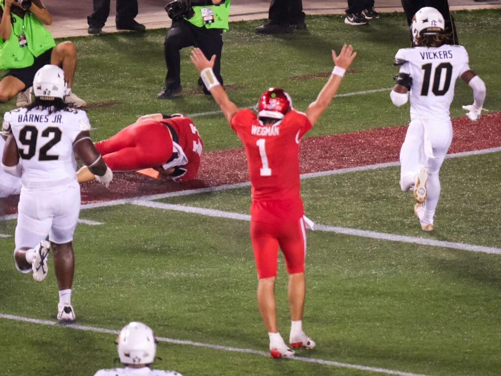 University of Houston quarterback Conner Weigman loves to celebrate touchdowns. (Photo by F. Carter Smith)