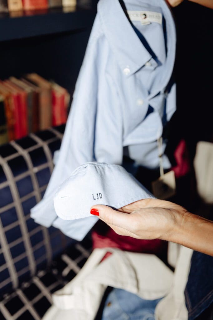 An embroiderer was on-site to monogram Duck Head's men's shirting (Photo by Vanessa Chavez)