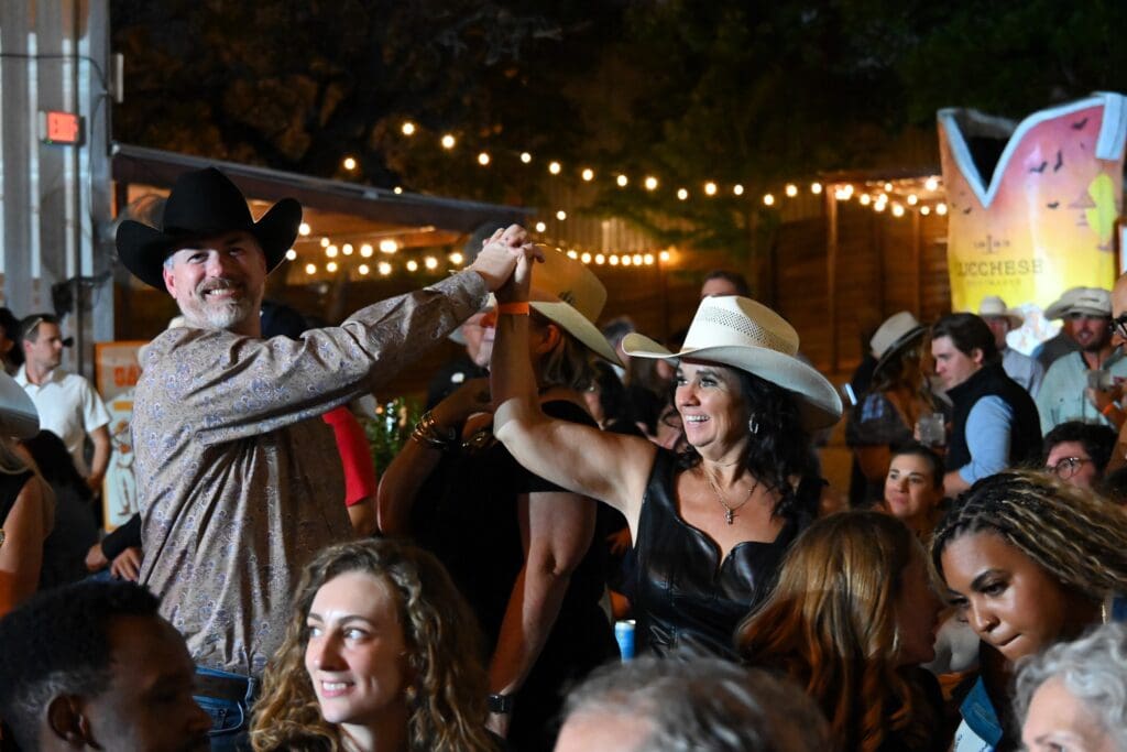 Tammy Stiffler bids on live auction (Photo by State Fair of Texas)