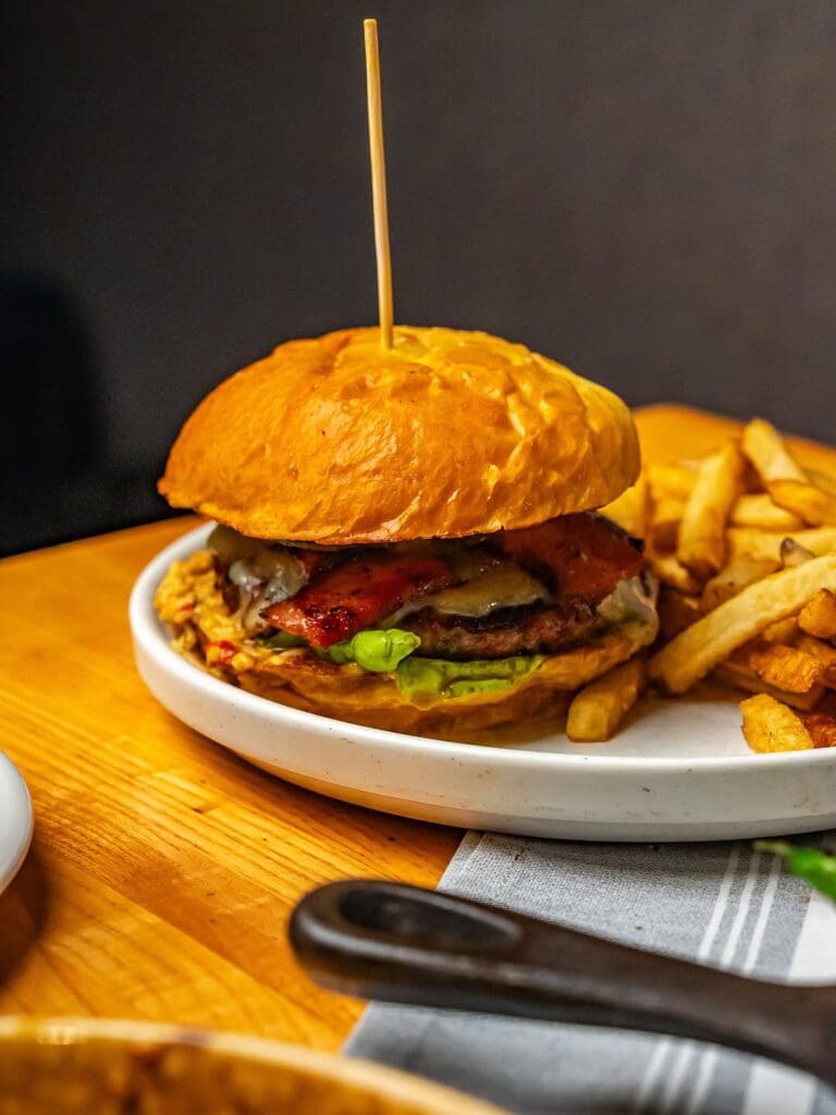 Fielding’s Wood Grill turns out smoky, wood-fired burgers made entirely in house. (Photo courtesy of Fielding’s Wood Grill)