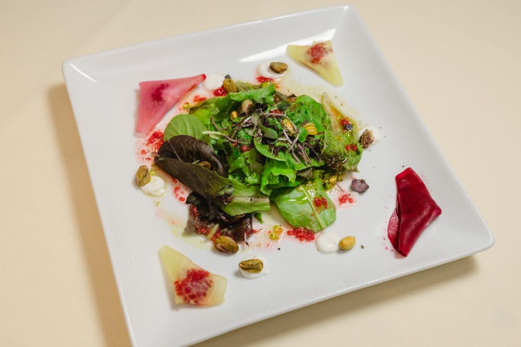 Beet, pistachio, raspberry ravioli salad with kefir cheese and pistachio oil served at the BCN luncheon(Photo by Johnny Than)