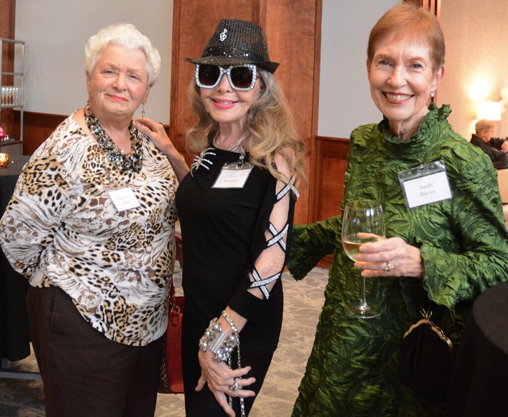 Conroe-area residents Charlotte Belin, Lyn Howard, and Sarah Baxter. Each are longtime Young Texas Artists supporters and volunteers. (Photo by David Hopper)

