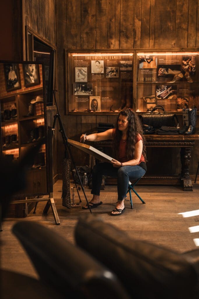 Fifteen local artists joined this year’s Fashion Week Stockyards Style, creating live paintings, sketches, and sculptures that celebrated Fort Worth’s Western heritage in their own unique ways. (Photo by Avin Park Photography)