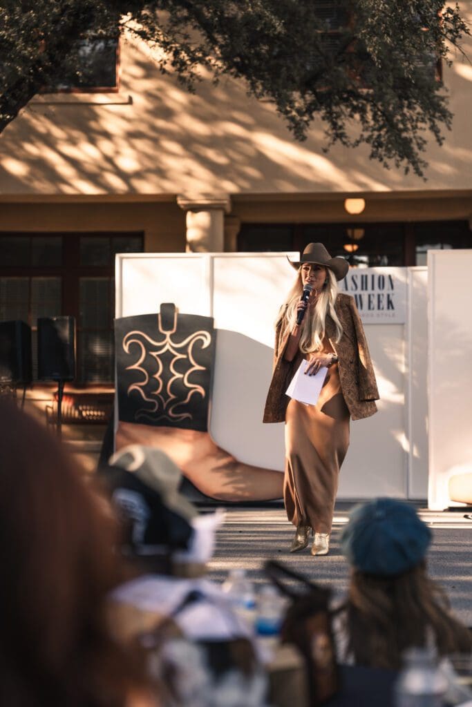 Kirbe Schnoor opened the show in a bronze slip and champagne boots, setting the tone for a stylish afternoon. (Photo by Avin Park Photography)