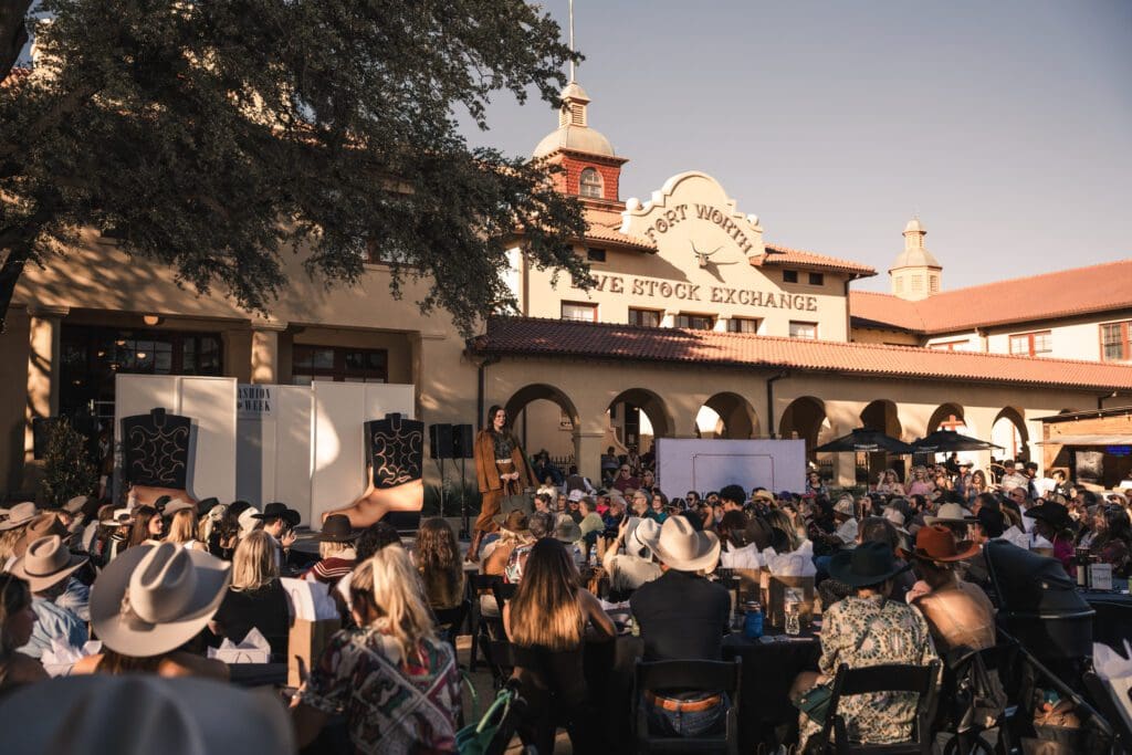 Crowds filled the Livestock Exchange Lawn on Saturday for Fashion Week Stockyards Style.  (Photo by Avin Park Photography)