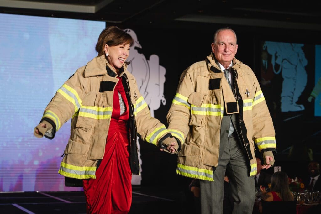 Chairs Elizabeth & Alan Stein at the Houston Fire Fighters 'Red Hot Gala' (Photo by Catch Light Group)