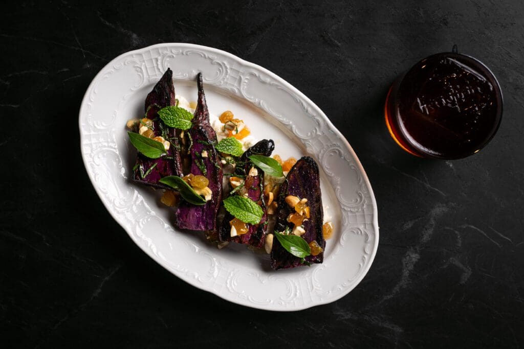 The Japanese sweet potato at Meridian is an innovative and sweet concoction of apricot, golden raisin, cashew, and stacciatella. (Photo by Dan Padgett)