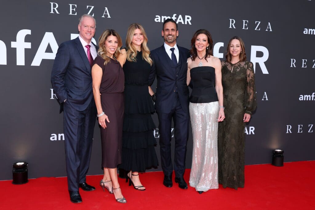 Jerry Jones Jr., Lori Lemon Jones, guest, Amir Rozwadowski, Charlotte Jones, EVP Chief Brand Officer, Dallas Cowboys and guest attend amfAR Dallas Gala at Private Residence on October 04, 2025 in Dallas, Texas. (Photo by Getty Images