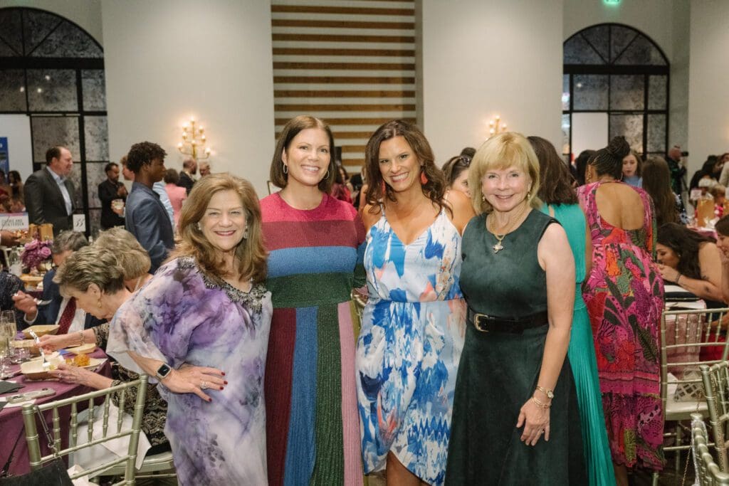 Linda Padon, Lauren Levicki Courville, Kristi McCarthy, Becky Roberts at the Dress for Success Houston Rendezvous. (Photo by Thomas Campbell)