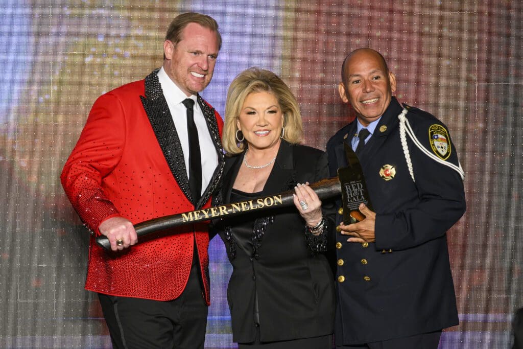Marty Lancton, Edna Meyer-Nelson,Carlos Pascualli at the Houston Fire Fighters 'Red Hot Gala' (Photo by Catch Light Group)