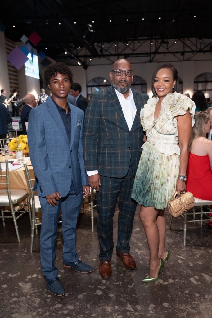 Matthew, Larry, and Melkeya McDuffie at Rendezvous With Dress for Success (Photo by Daniel Ortiz)