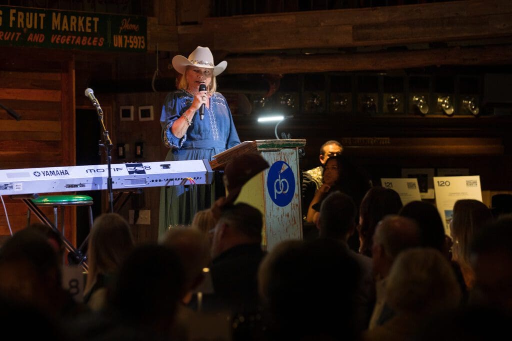 Executive Director Kelly Baughman shared Project Beacon update during "A Night in Nashville." (Photo courtesy of Project Beacon)