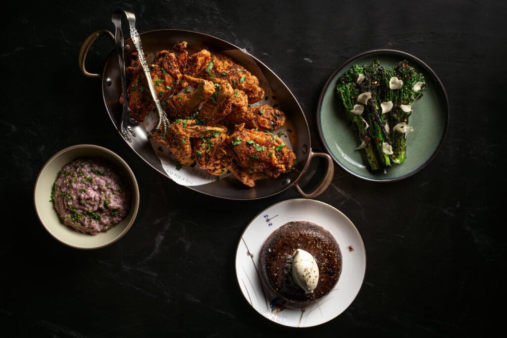 At Meridian, the family-style Sunday Supper ($99) feeds three to four people and features a whole fried chicken, sides, and dessert. (Photo by Dan Padgett)