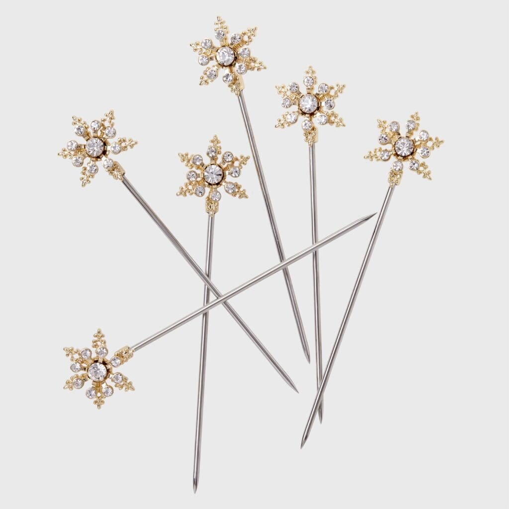 Bejeweled cocktail picks make any dessert or cheese plate more elegant - and they are perfect to spear on olive, too.
