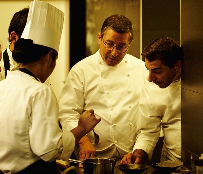 Chefs in the kitchen of El Celler de Can Roca in Spain (Photo by Johnny Than)