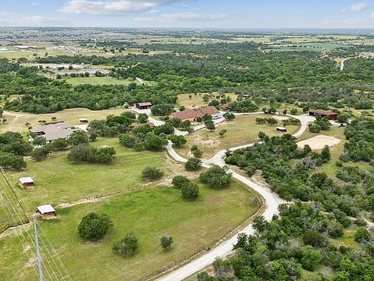 The 50-acre Lazy H Ranch in west Fort Worth offers luxury living amid rolling pastures and wide-open views of Tarrant County. (Courtesy)