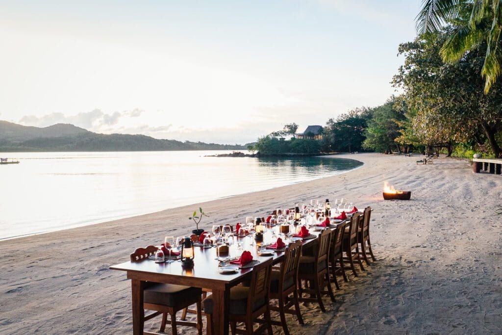If you aren't opting for a private dinner, meals are served at a family table that moves around the island.  (Photo by Turtle Island)