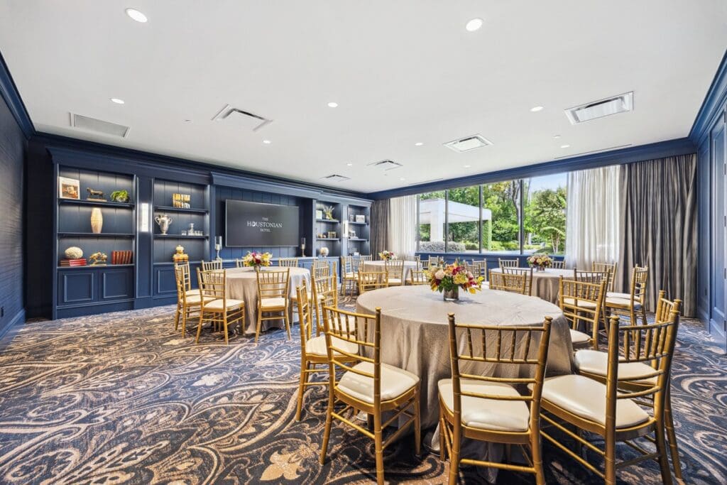The Mahogany and Teak Rooms feature wooded views and stately millwork, carpets, Shantung wallcoverings, and custom cabinetry in stately hues of deep blue and gold. (Photo by TK Images)