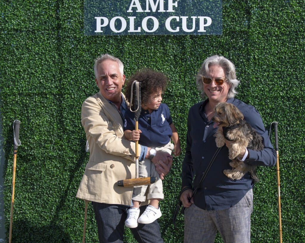 Darin Kunz (holding Jordan), Clint Bradley, and Tank the dog (Photo by Tamytha Cameron)