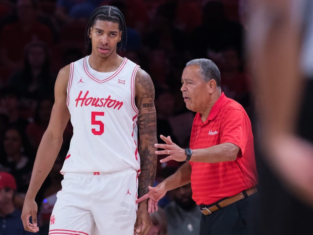 University of Houston freshman big man Chris Cenac Jr. and coach Kelvin Sampson are working. (Photo by F. Carter Smith)