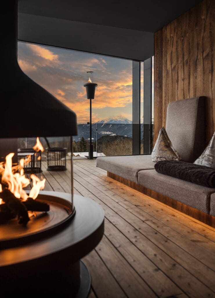 Guests at Chalet Mirabell can unwind year-round at the resort’s expansive mountain spa, featuring saunas, steam rooms, and outdoor hot tubs overlooking the Italian Alps.