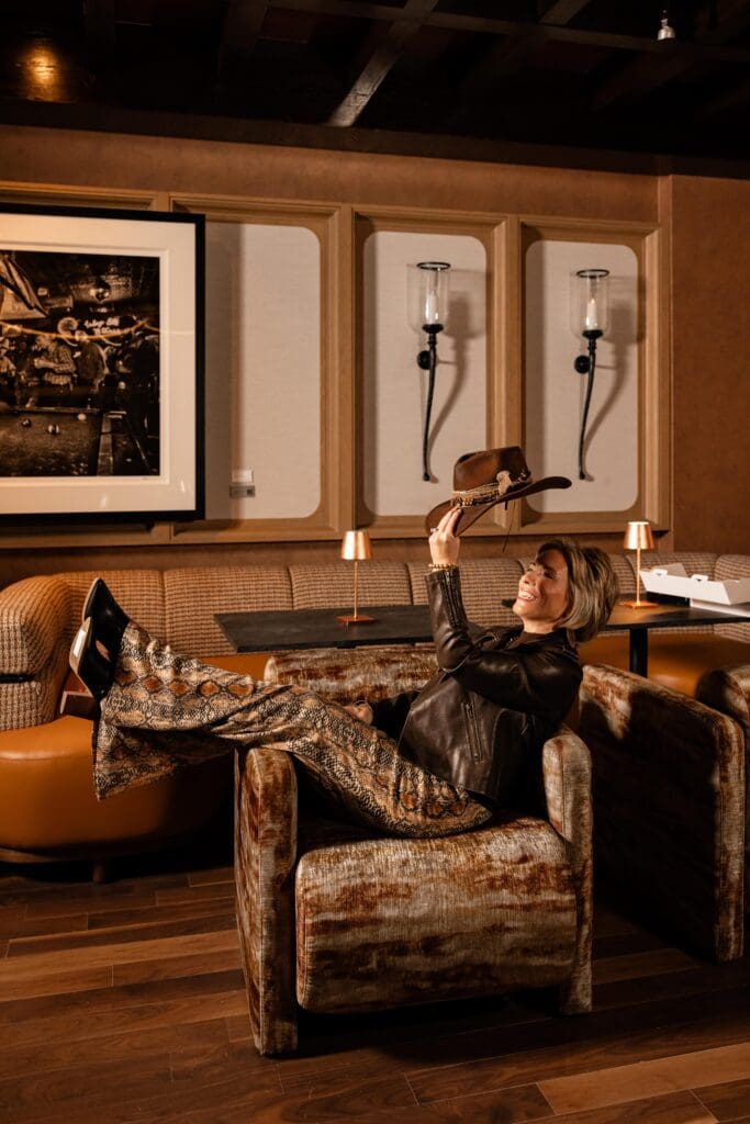 Warm wood tones, rich leather, and dramatic art give Social Outlaw its signature blend of sophistication and edge. (Courtesy)