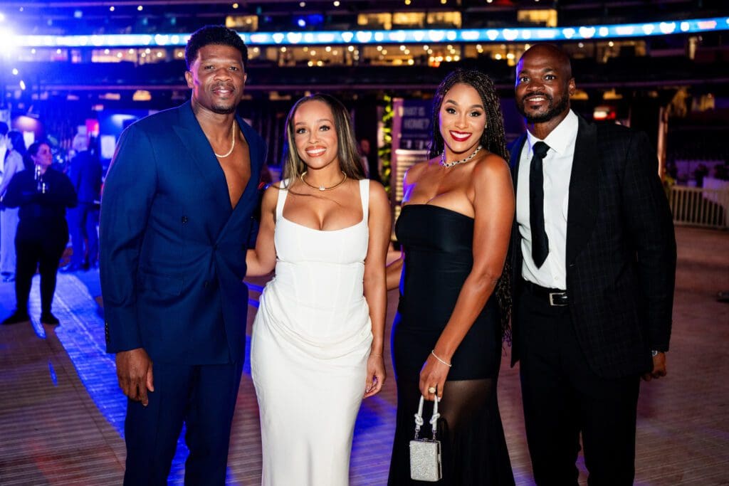 NFL Hall of Famer, former Houston Texan wide receiver Andre Johnson, Eysha Woodson, former NFL running back Adrian Peterson & Ashley Peterson at the 'Diamond Dreams' gala (Photo courtesy of Houston Astros)