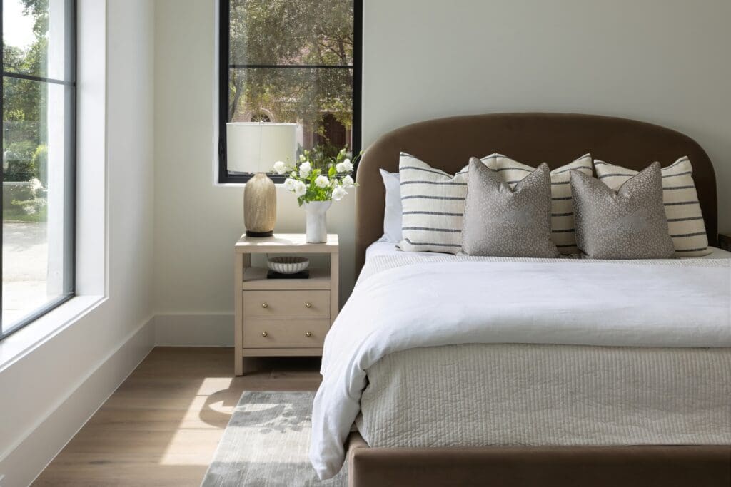 One of five bedrooms in the home at 11606 Blalock Lane. (Photo by Laurie Perez)