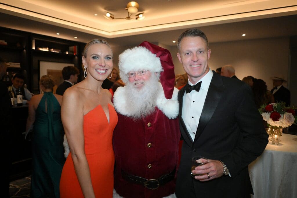 : Kellie Brumbaugh, Santa, Lee Brumbaugh at the Trees of Hope gala (Photo by Al Torres Photography)