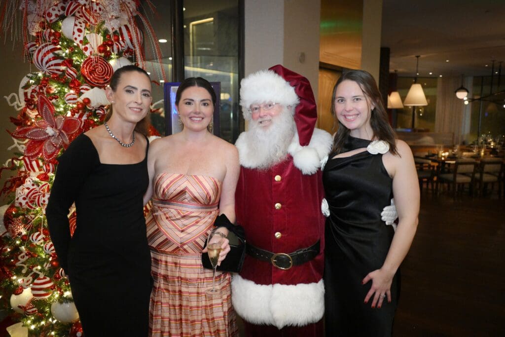 Carly West, Trees of Hope president Lisa Barth, Santa, Trees of Hope executive director Brooke Stuckey at the Trees of Hope gala (Photo by Al Torres Photography)