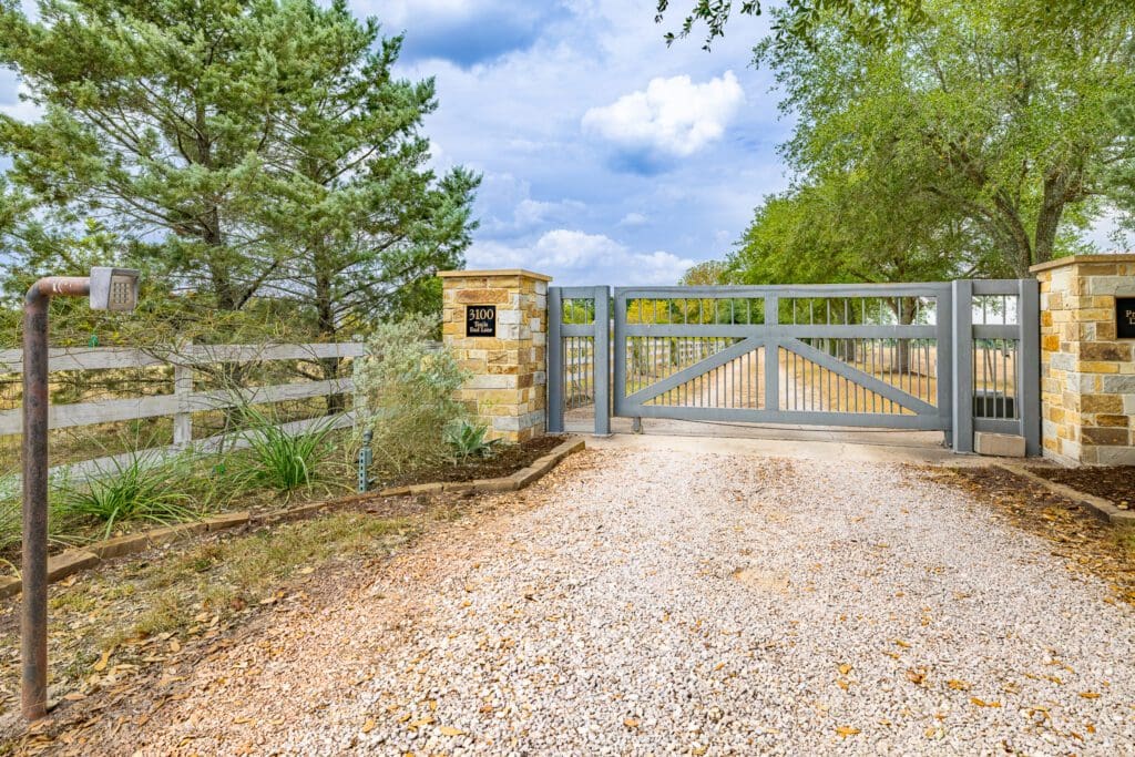 The entry gate to 3100 Trail's End in Brenham (Photo by Courtesy of Nan & Company Properties)