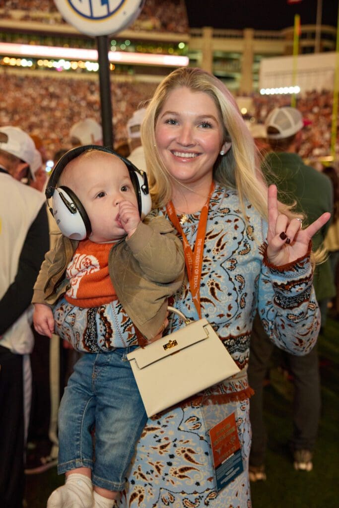Bailey Bell Layne, son Hudson at Cotton Holdings' Lone Star Showdown tailgate party (Photo courtesy of Cotton Holdings) (Photo by Courtesy of Cotton Holdings)