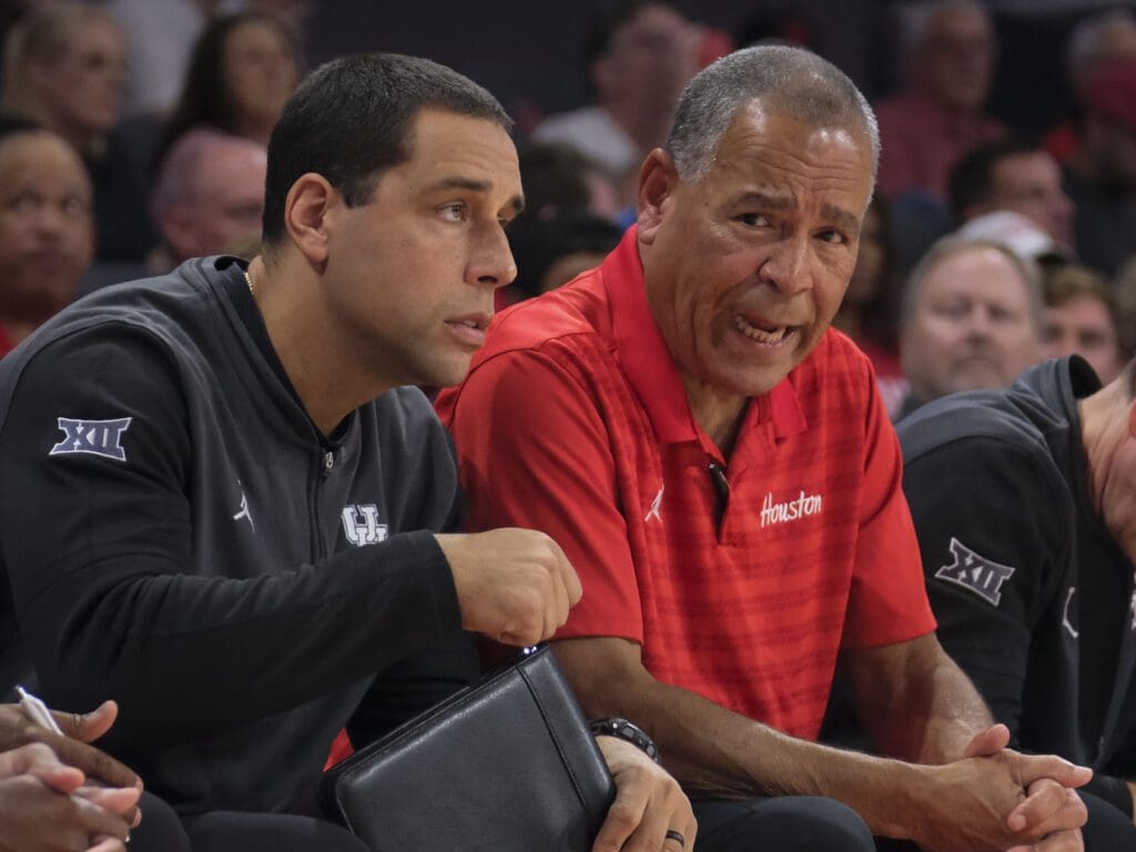 University of Houston assistant coach Kellen Sampson and Kelvin Sampson coach side by side. (Photo by F. Carter Smith)