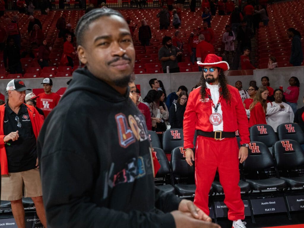 University of Houston point guard great Jamal Shead's trip home would not be complete without seeing his Cougars. (Photo by F. Carter Smith)