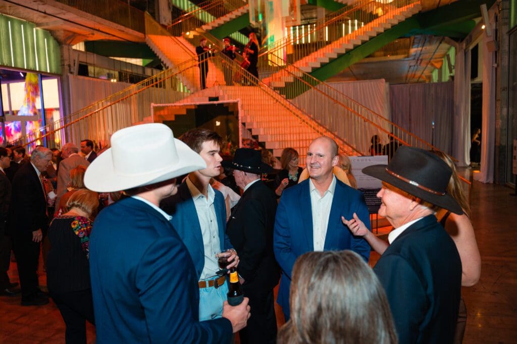 Guests at the Ucross gala mingle at POST Houston before the seated dinner