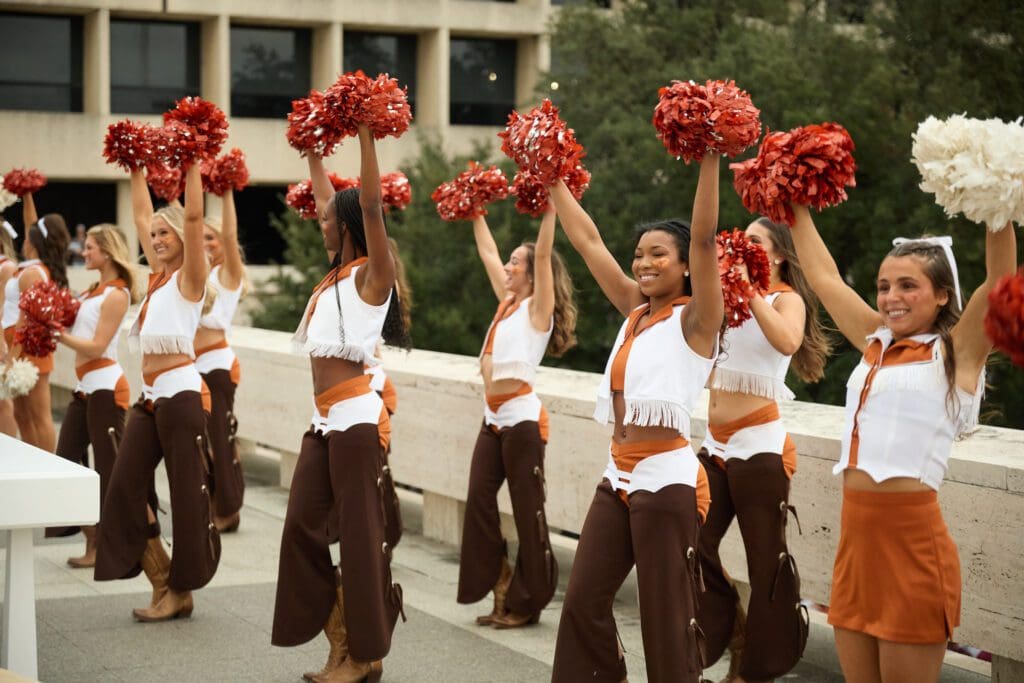 University of Texas Cheerleaders and Pom Squad at Cotton Holdings Lone Star Showdown tailgate (Photo courtesy of Cotton Holdings) (Photo by Courtesy of Cotton Holdings)