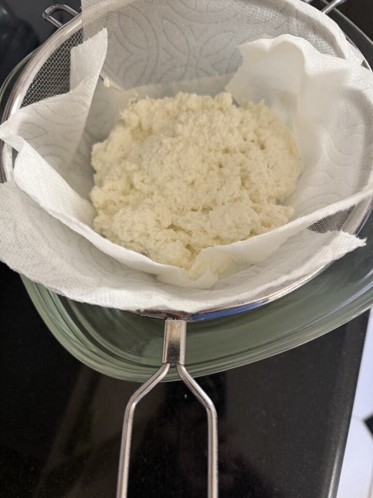Straining ricotta allows you to control the moisture level in your creation.