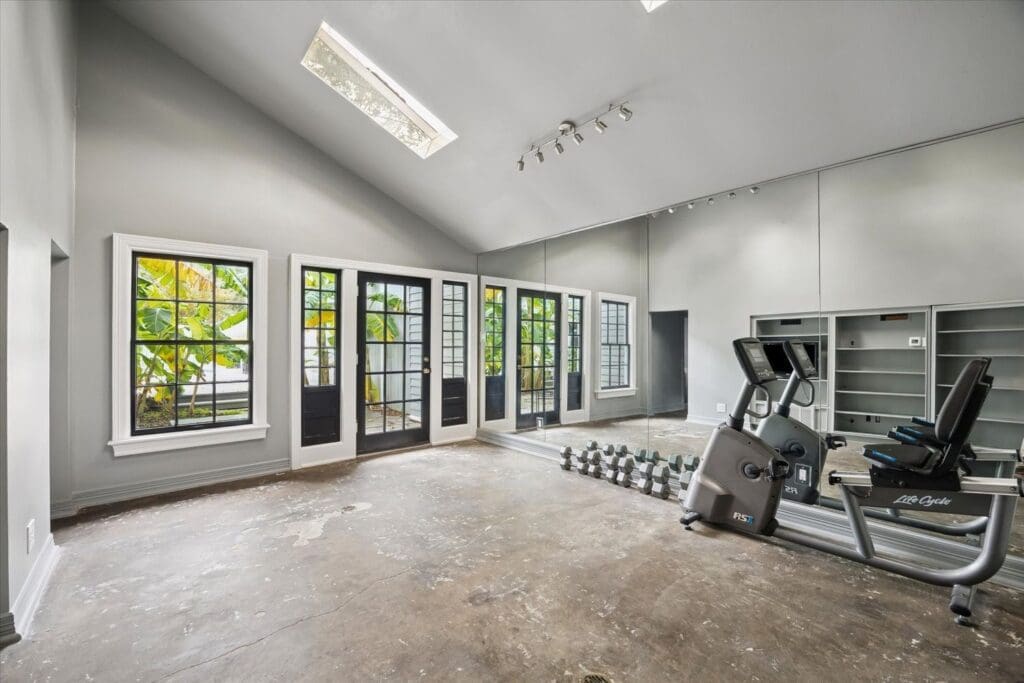 The pool house with bath and kitchen could be used as additional quarters at 200 Westmoreland (Photo by TK Images)