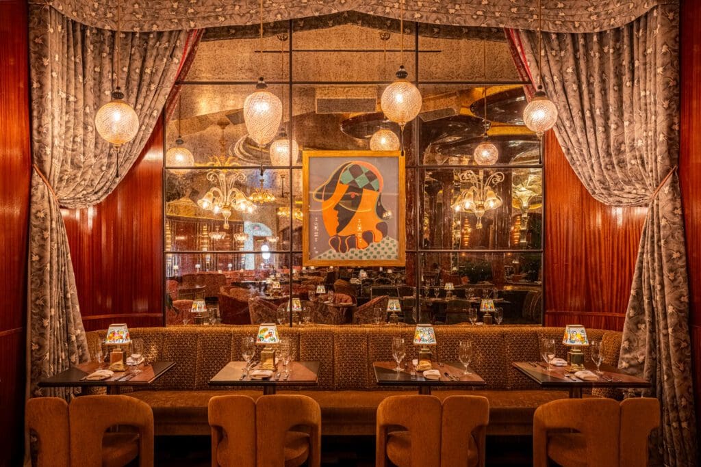 Each location presents its own personality, and Dallas will blend the classic Delilah elements like burlwood, lush pink velvet booths, dim lighting, and chandeliers, with bold new design touches like "Blue Explosion marble as the main accent at bars. (Photo by Robert Tsai)