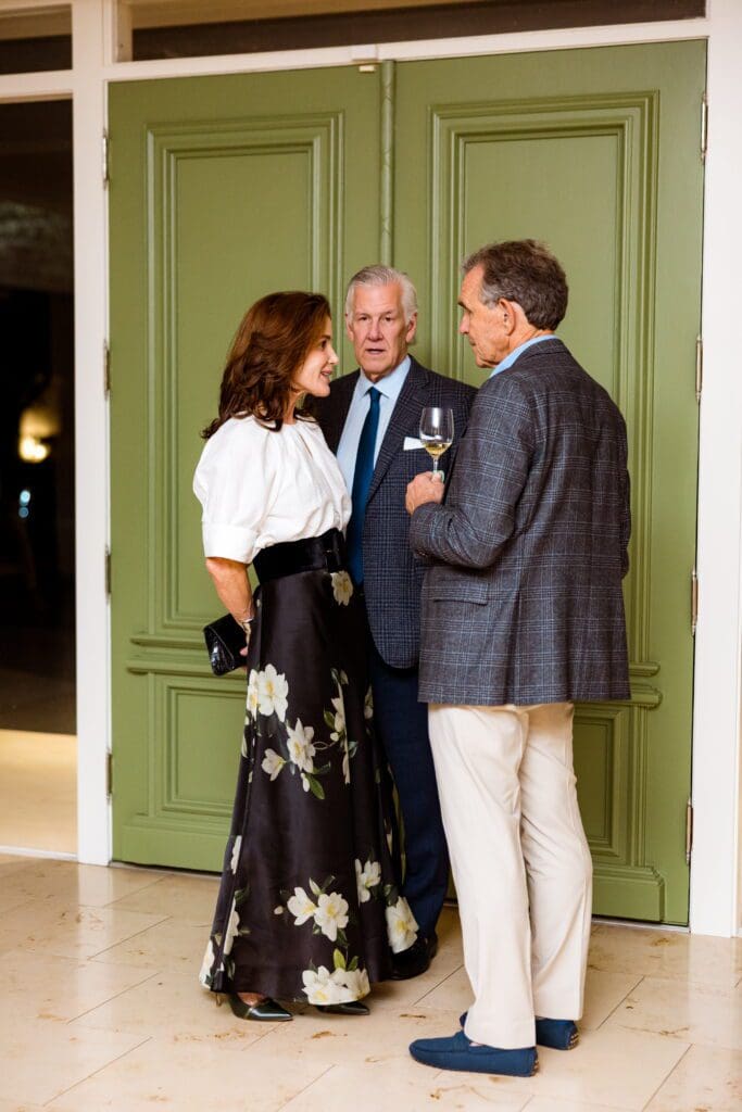 Colleen & Phil Smith and host Michael Dumas at the Dora Maar Cultural Center celebration.