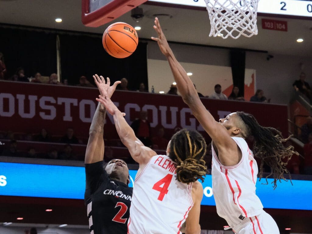 University of Houston point guard Kingston Flemings and big man JoJo Tugler are quite a team. (Photo by F. Carter Smith)