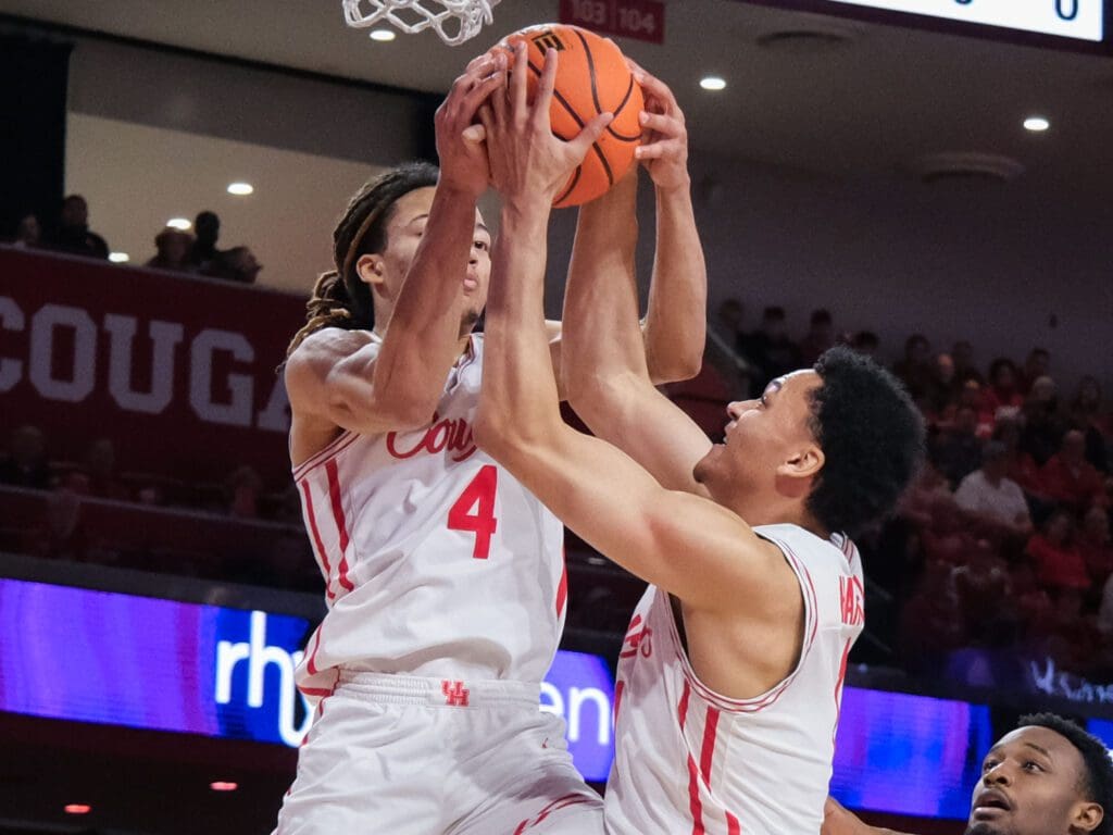 University of Houston freshman guards Kingston Flemings and Isiah Harwell weren't letting this rebound go. (Photo by F. Carter Smith)