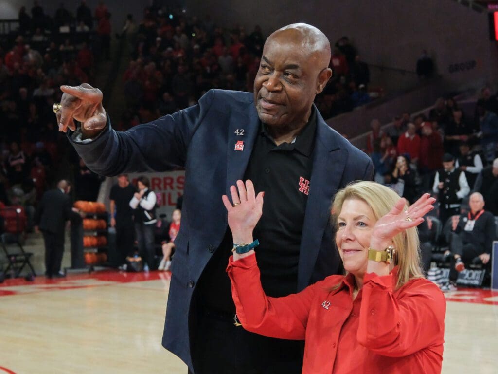 All-time UH great Dwight Davis and his wife Gayle enjoyed No. 42's long-awaited moment. (Photo by F. Carter Smith)