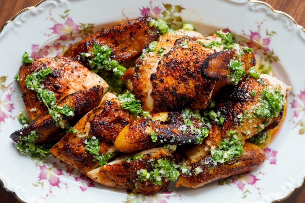 The half-roasted chicken with sweet plantains and Mediterranean chutney is a stunner at Ateliê. (Photo by EJ Galvez)