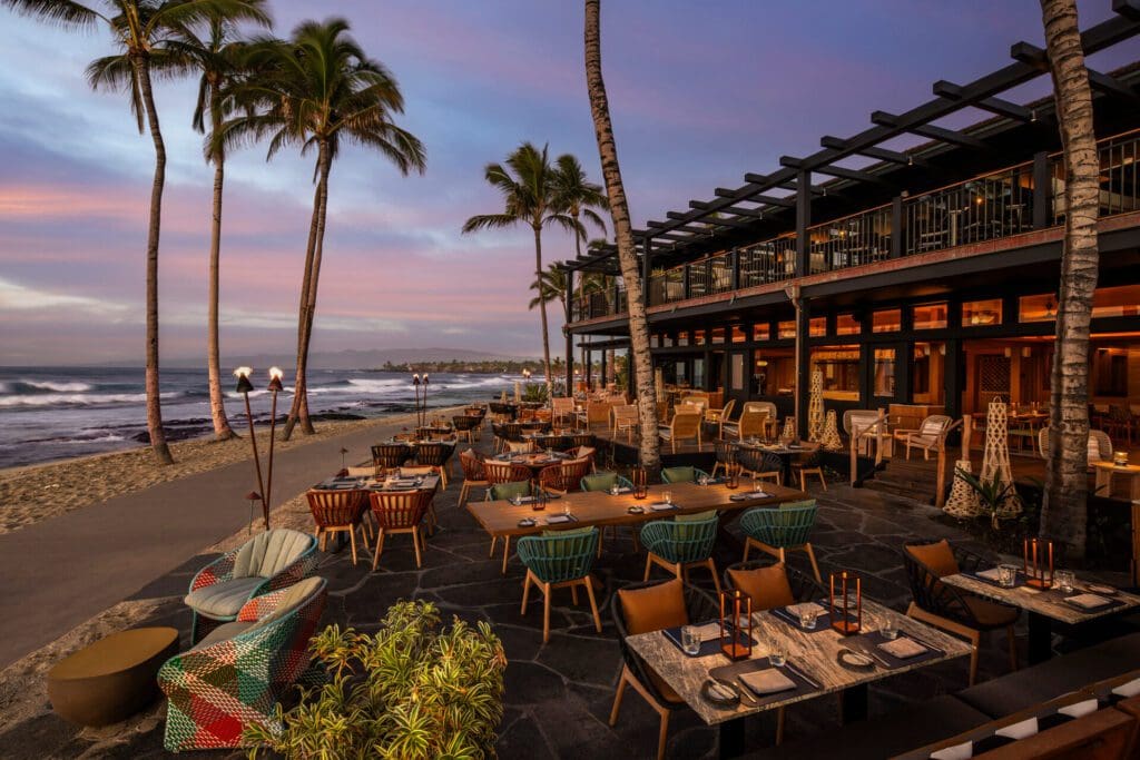 'ULU is perched just beyond the surf and in THE prime sunset viewing location. (Photo by Four Seasons Resort Hualalai)