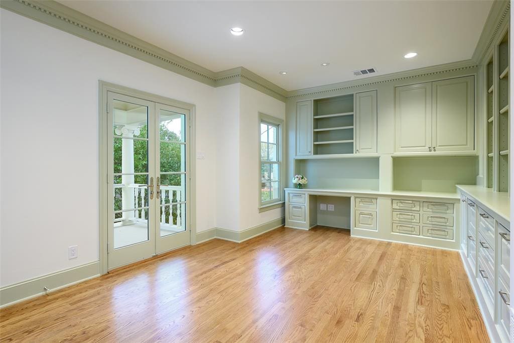 A dedicated office provides a beautiful space to work from home. (Photo by Compass RE Texas, LLC)