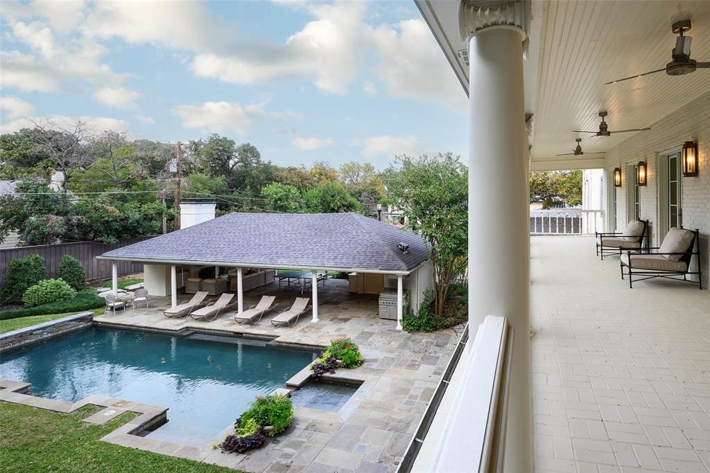 The 6,248-square-foot classic beauty boasts five bedrooms (with porch access from every bedroom, my dream) and five bathrooms. (Photo by Compass RE Texas, LLC)