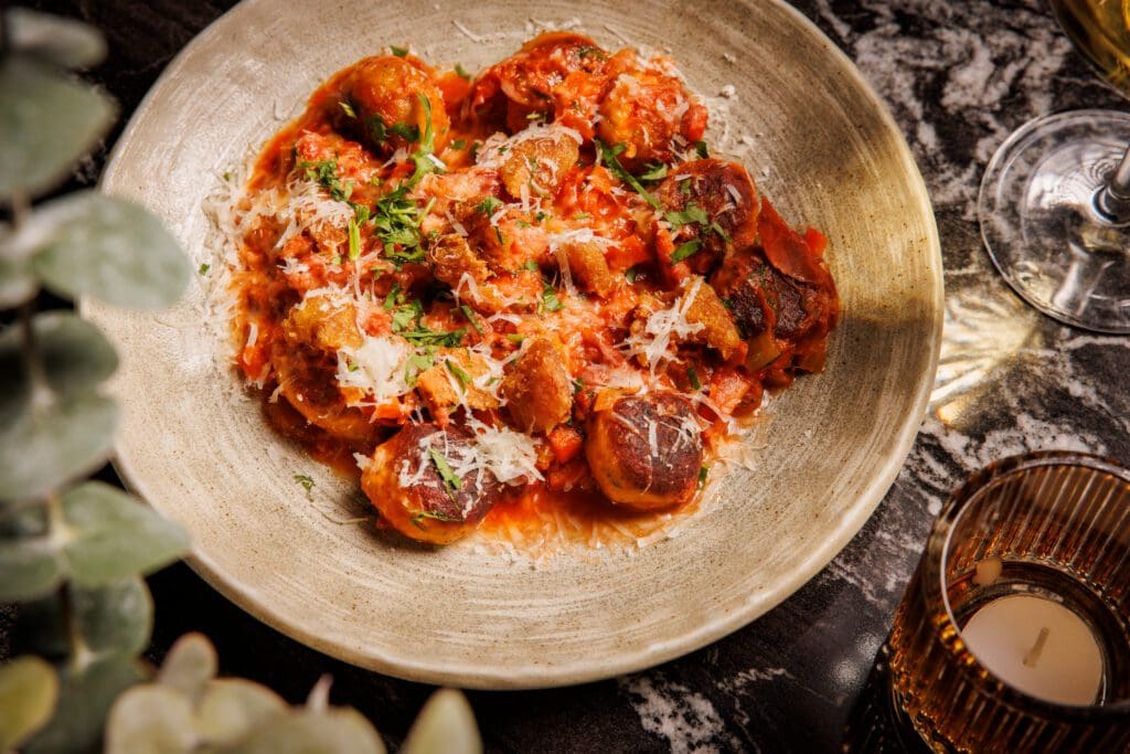 Don't miss the ricotta gnudi with pulled duck at The Saint. (Photo by Samantha Marie Photography)