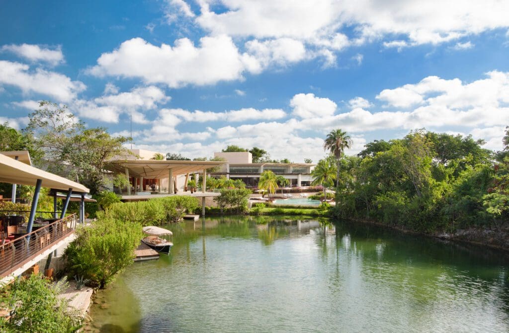 Nestled in an emerald jungle and surrounded by winding lagoons, Rosewood Mayakoba provides guests an otherworldly respite. (Photo by Rosewood Mayakoba)