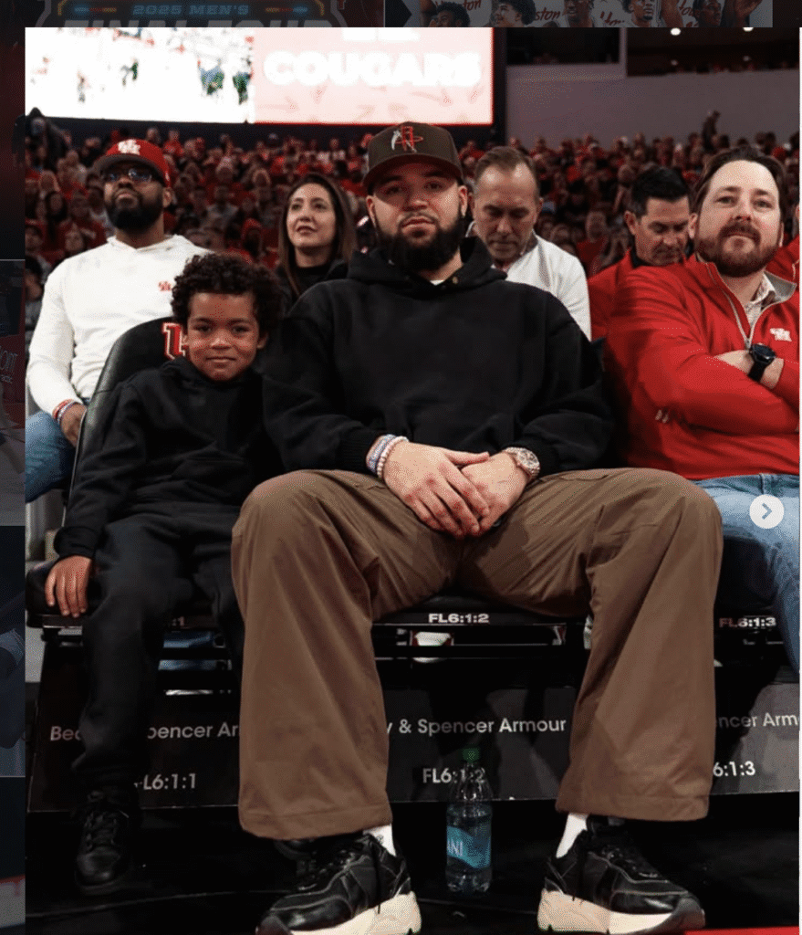 Houston Rockets guard Fred VanVleet came to the Fertitta Center with his son Fred VanVleet Jr. to watch Kelvin Sampson's University of Houston team play. (@UHCougarMBK) 